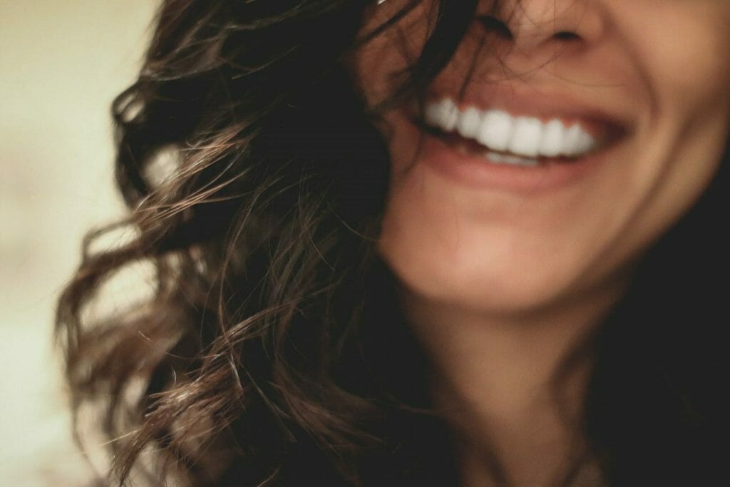 A close up of a woman's smile